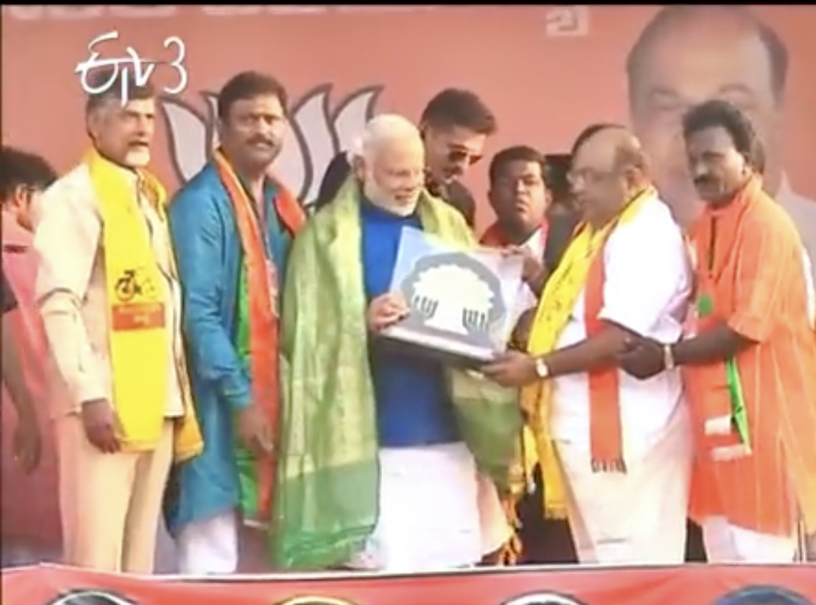On stage with Hon'ble Prime Minister Shri Narendra Modi at a public rally
