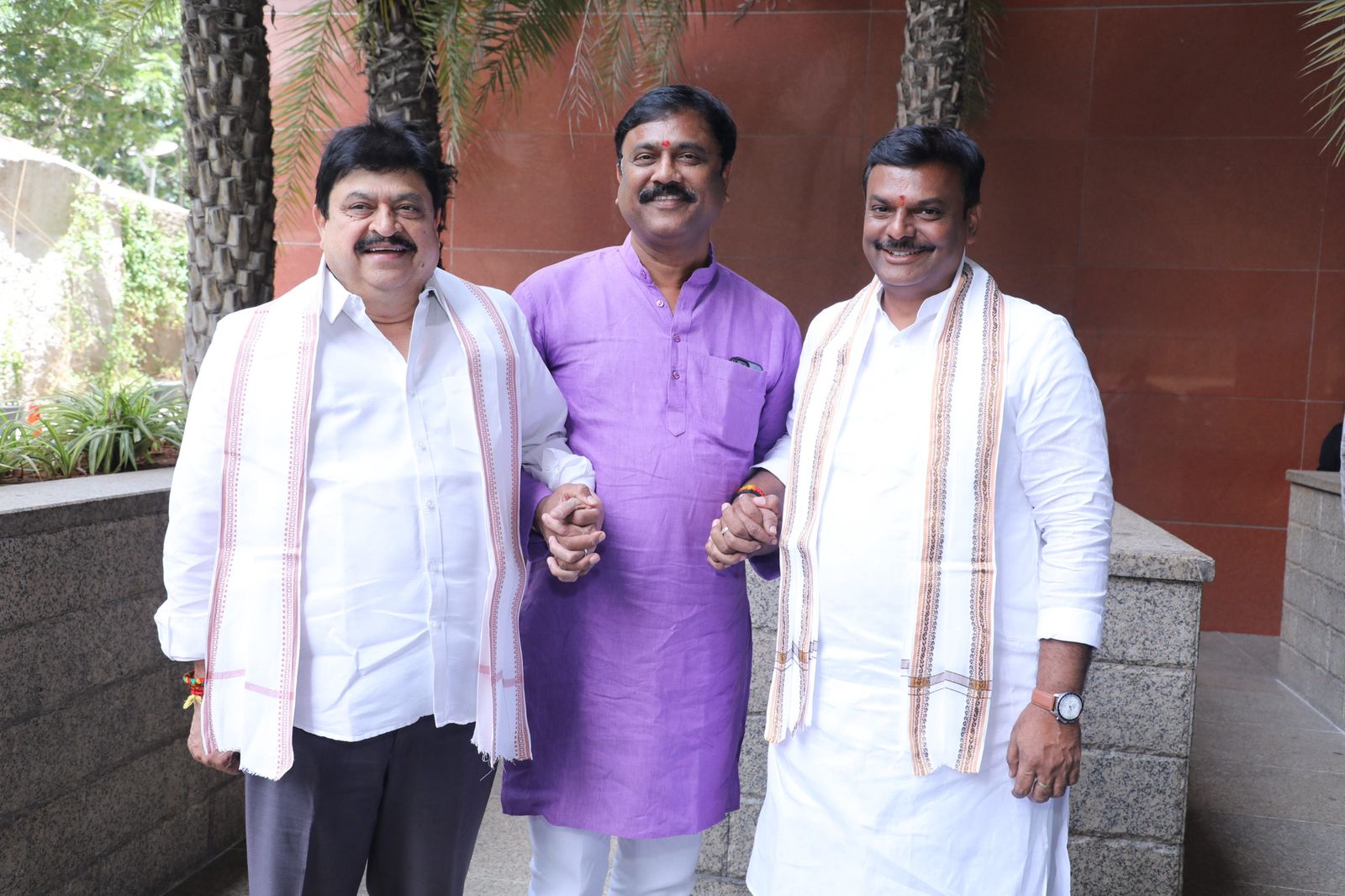 With senior party colleagues